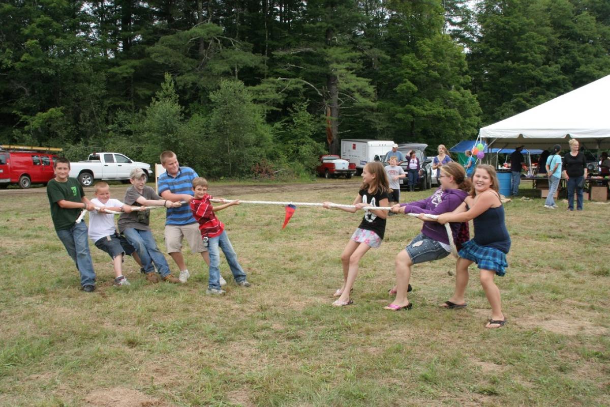 Children playing tug-of-war at the 250th Anniversary in Sandisfield